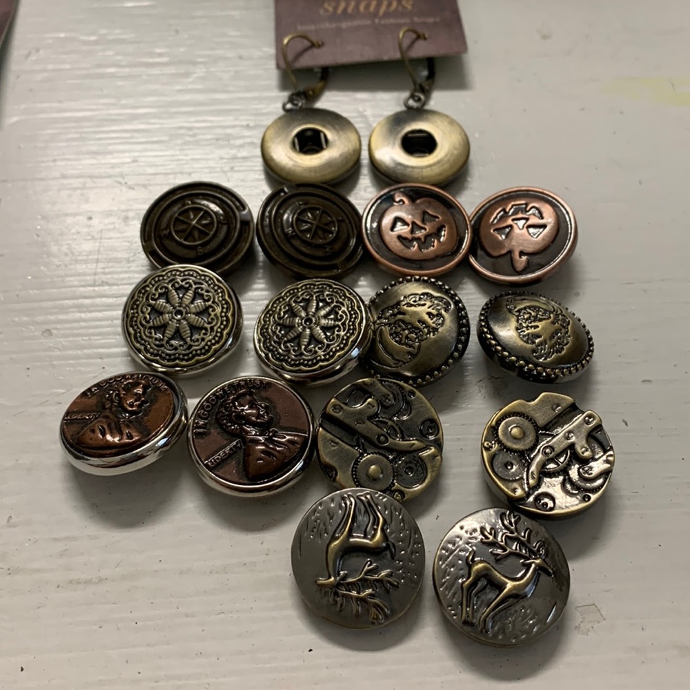 One pair leverback earrings with 7 pair matched snap buttons in brass NWT